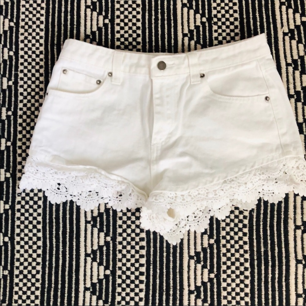 White denim shorts with knit details on ends